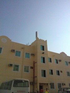 Camouflage antenna on residential building